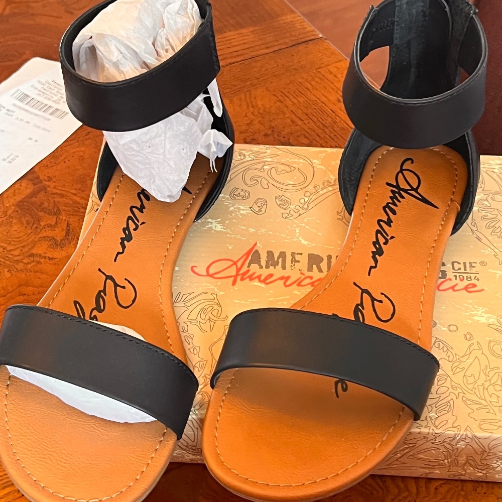 Black sandals never worn